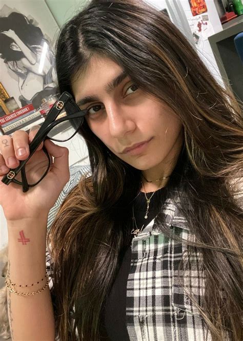 Mia Khalifa auctions glasses from her adult films to support .